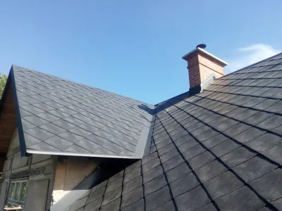 Falcovaná střecha s vikýřem