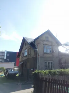 Falcovaná střecha s vikýřem