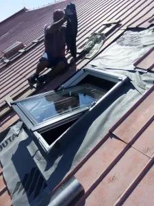 Výměna střešních výlezů za střešní okna