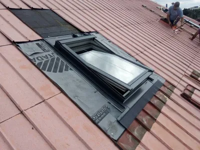 Výměna střešních výlezů za střešní okna