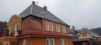 Rekonstrukce mansardové střechy šablonami PREFA